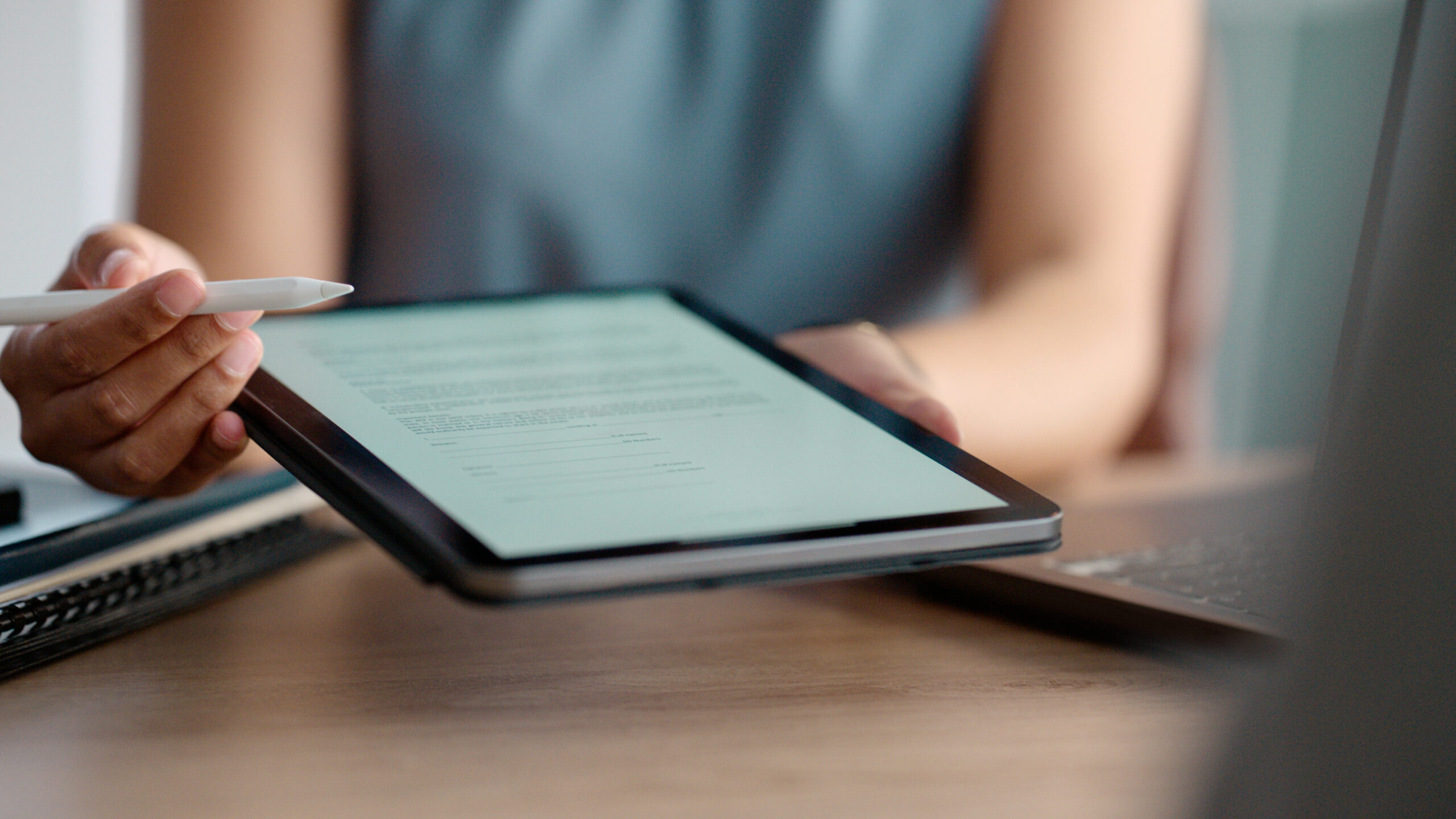 Hands, tablet and online agreement for contract meeting for signature with employment for document, form or collaboration. Businessperson, pen and internet partnership in London, digital or paperwork