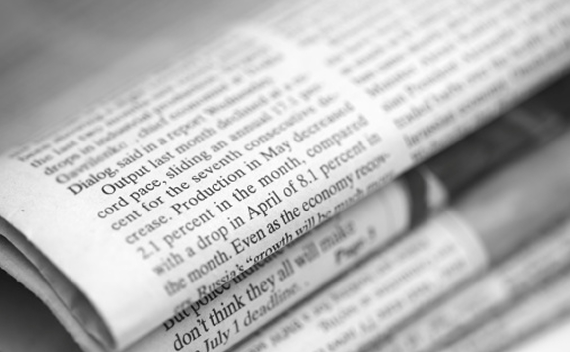 Newspapers heap. Close-up. Black and White.. Shallow depth of field.